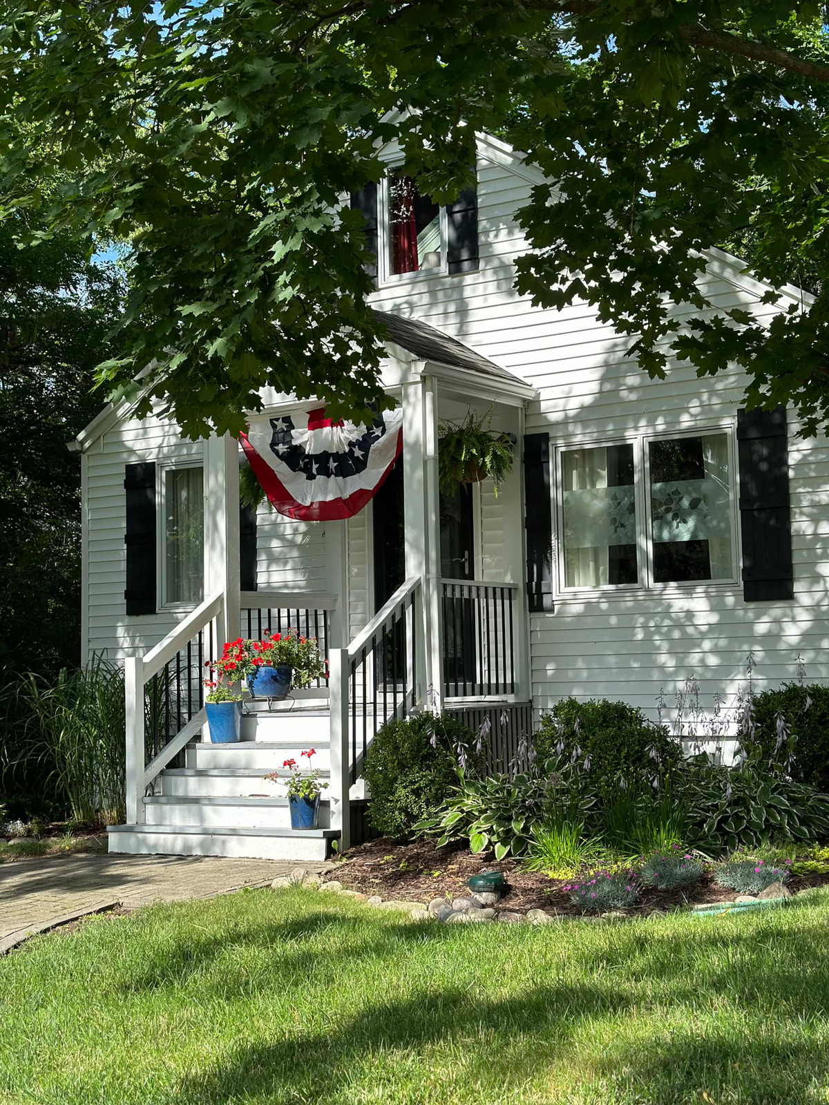Exterior of Walnut Cottage with front porch